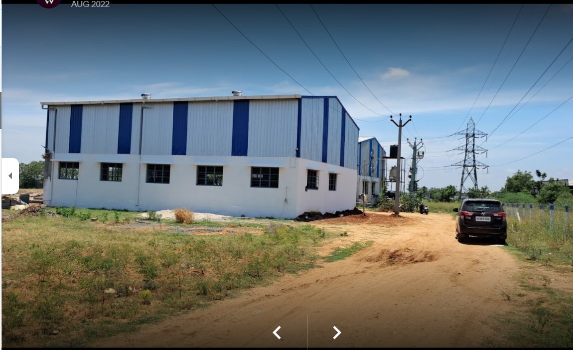 Vedanth Industrial Zone full site view showing both factory buildings with HD power lines, Coimbatore